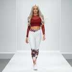 Load image into Gallery viewer, Woman wearing a red long-sleeve top and white leggings with floral patterns on a white background
