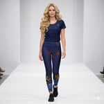 Load image into Gallery viewer, Woman modeling Lunar Legends Year of the Horse women’s yoga leggings with matching dark blue athletic pickleball shirt by SKYblue Pickleball
