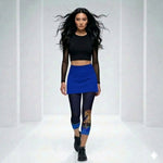 Load image into Gallery viewer, Female model wearing Lunar Legends horse performance capri leggings with light blue accents in athletic pickleball outfit walking in modern studio setting
