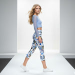 Load image into Gallery viewer, Woman wearing a blue long-sleeve top and patterned leggings on a white background
