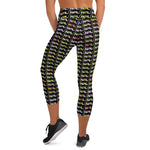 Load image into Gallery viewer, NPL™ Pop-Art Women&#39;s Pickleball Capris – Black/Multi-Color: Your Passport to the Perfect Pickleball Session with UPF 50+ Protection!
