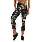 Load image into Gallery viewer, NPL™ Pop-Art Women&#39;s Pickleball Capris – Black/Multi-Color: Your Passport to the Perfect Pickleball Session with UPF 50+ Protection!
