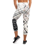 Load image into Gallery viewer, Back view of women's high-waisted tennis and padel capris with plaid and tennis ball print
