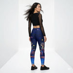 Load image into Gallery viewer, back view of woman wearing lunar legends dragon pickleball leggings with colorful dragon design and dark blue athletic activewear by skyblue pickleball
