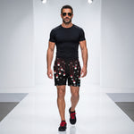 Load image into Gallery viewer, Poinsettia Pickleball© Men's Pickleball Shorts with Liner, worn by model | SKYblue Pickleball
